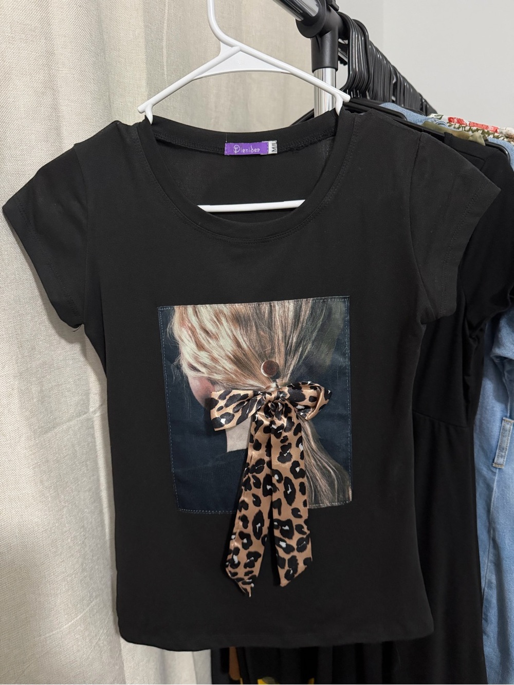 Black Graphic Tee with Leopard Bow Detail